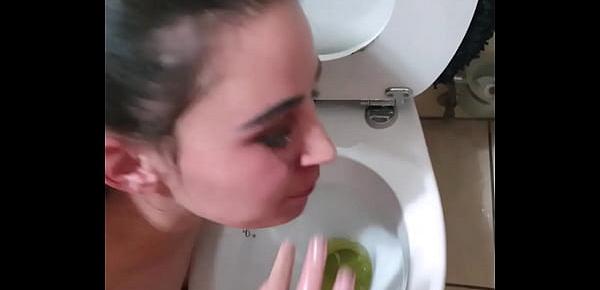  Pigtailed teen sucks dick after being pissed on and licking the toilet clean | face spitting and slapping